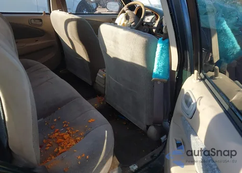 2001 Toyota Corolla Le z USA, uszkodzony, nr VIN 2T1BR12E31C458278